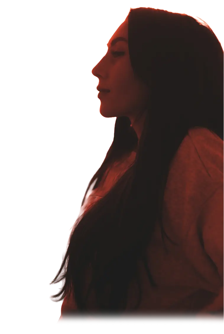 Woman experiencing a profound healing retreat, achieving mental wellness and inner peace through yoga, meditation, and mindfulness for personal growth.